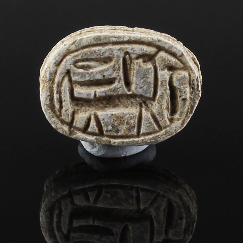 Egyptian scarab with horse with schematic signs with inscription Amun ...