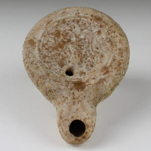 Roman oil lamp with leaves and fruit