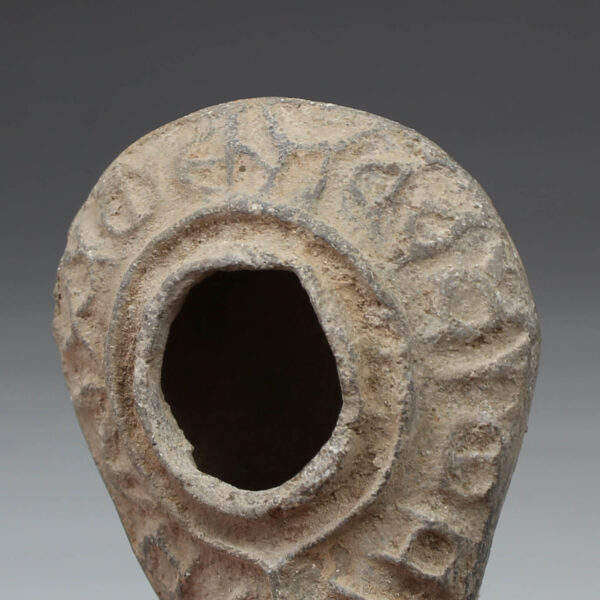 Byzantine oil lamp with inscription ‘The light of Christ shines for all’