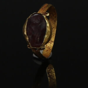 Roman ring with red carnelian gem depicting Sol with crown of rays